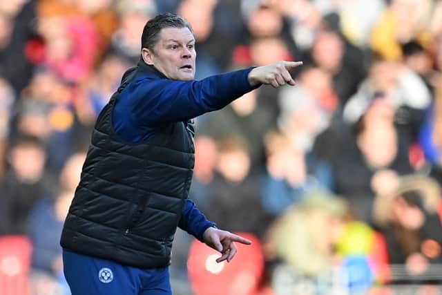 Shrewsbury Town's English manager Steve Cotterill shouts instructions to his players from the touchline during the English FA Cup third round football match between Liverpool and Shrewsbury Town at Anfield in Liverpool, north west England on January 9, 2022. (Photo by PAUL ELLIS/AFP via Getty Images)