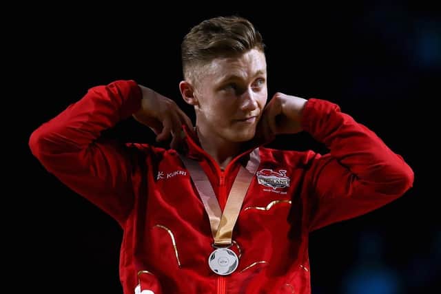 Silver medalist Nile Wilson of England poses during the medal ceremony at the Gold Coast 2018 Commonwealth Games. (Pic credit: Dean Mouhtaropoulos / Getty Images)