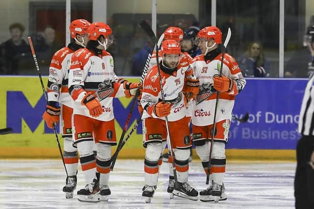 ICE ROAD MUCKERS: Captain Robert Dowd celebrates one of his two goals in Sheffield Steelers' 5-0 win at Dundee Stars on Sunday night. Picture: Derek Black/EIHL Media.