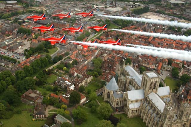 The RAF Red Arrows fly over York Minster.