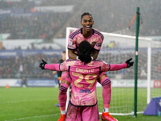 Leeds United's Wilfried Gnonto celebrates scoring his side's fourth goal of the game with team-mate Crysencio Summerville during the Sky Bet Championship match at the Swansea City. Photo: David Davies/PA Wire.