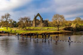 Members of the public enjoying the unseasonably mild winter weather during a day out exploring Bolton Abbey. (Pic credit: James Hardisty)