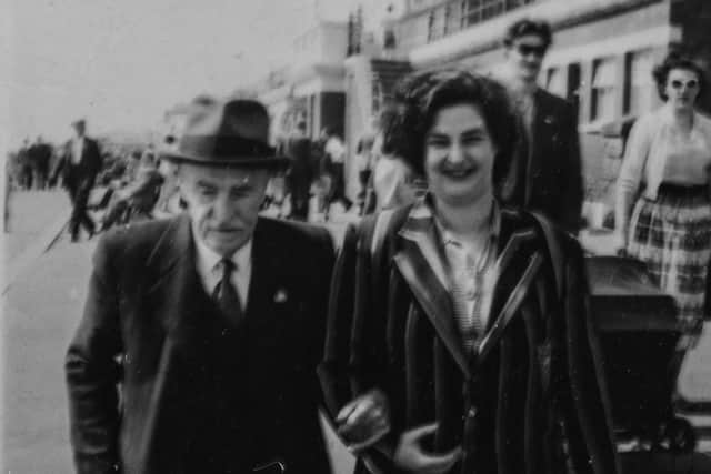 Copy picture of Ernest Whiteley with his grand-daughter Ann Clough who took over the ladies outfitters in Bridlington.