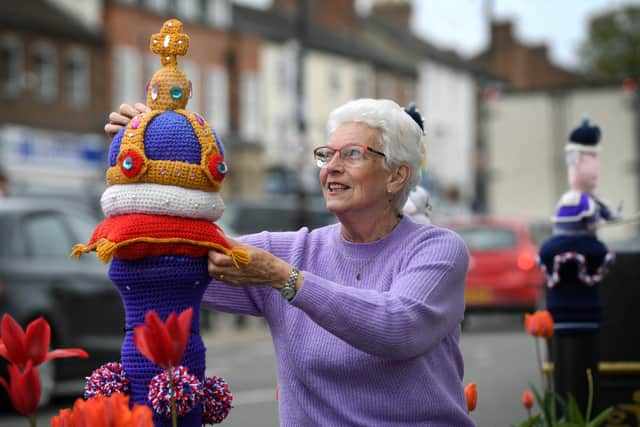 Thirsk yarnbombers have been knitting creations for the kings coronation, to decorate the town's Market Square.
Pictured Elaine Bowman. Photographed by Yorkshire Post photographer Jonathan Gawthorpe.