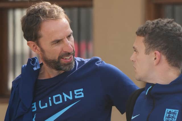 England's coach Gareth Southgate (L) and England's defender Kieran Trippier leave the team hotel in Doha on December 11, 2022, the day after losing their Qatar 2022 World Cup quarter-final football match against France. (Picture: PAUL ELLIS/AFP via Getty Images)