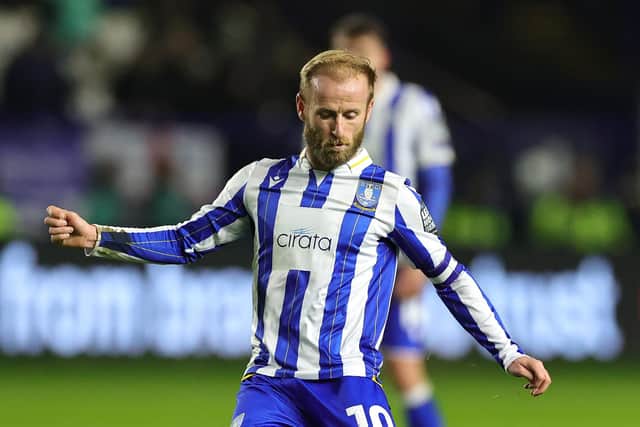 SHEFFIELD, ENGLAND - MARCH 05:  Barry Bannan of Sheffield Wednesday passes the ball during the Sky Bet Championship match between Sheffield Wednesday and Plymouth Argyle at Hillsborough on March 05, 2024 in Sheffield, England. (Photo by David Rogers/Getty Images)