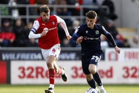 Rotherham United's Dan Barlaser (left) and Blackburn Rovers' Jack Vale battle for the ball during the Sky Bet Championship match at the AESSEAL New York Stadium, Rotherham. Picture: Richard Sellers/PA