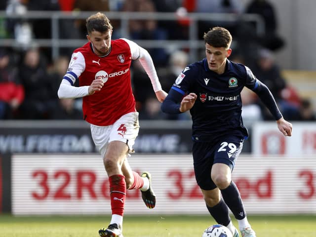 Rotherham United's Dan Barlaser (left) and Blackburn Rovers' Jack Vale battle for the ball during the Sky Bet Championship match at the AESSEAL New York Stadium, Rotherham. Picture: Richard Sellers/PA
