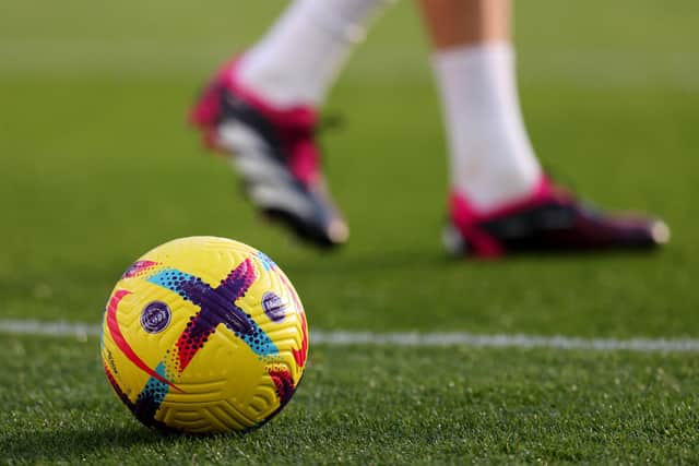 LONDON, ENGLAND - JANUARY 21: A detailed view of the Nike Flight Hi-Vis Premier League match ball prior to the Premier League match between West Ham United and Everton FC at London Stadium on January 21, 2023 in London, England. (Photo by Alex Pantling/Getty Images)