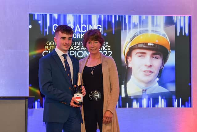 Top rider: Ryan Sexton is presented with the Go Racing in Yorkshire Apprentice of the Year award for 2022 by Wendy Hoggard from sponsors White Rose Saddlery.
Picture: Hannah Ali