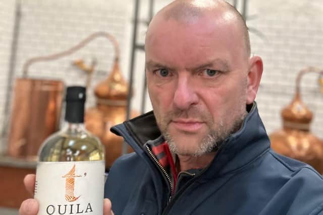 Chris Taplin of the Wensleydale Spirit Company with the offending bottle of spirit.