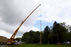 Two 100ft Douglas Fir poles have been craned into place at the Showground ready for the spectacular Great Yorkshire Show Pole Climbing Championships.