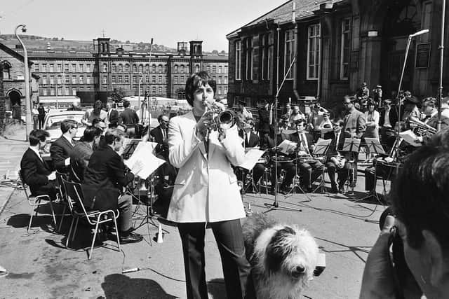 Paul McCartney plays trumpet playing with Black dyke mills brass band accompanied by Martha the Old English sheepdog in Saltaire June 1968
Picture:
(Trinity Mirror / Mirrorpix / Alamy Stock Photo).