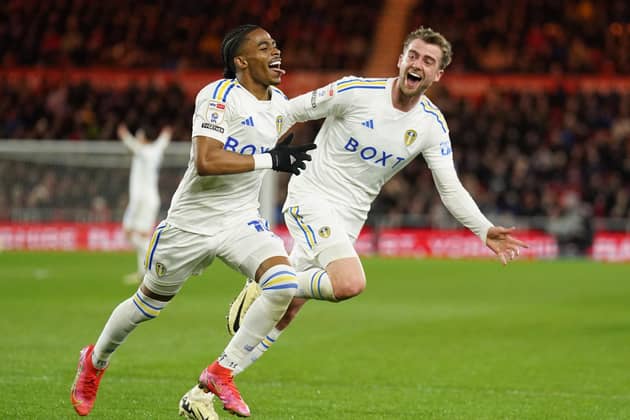 Leeds United's Crysencio Summerville (left) celebrates with Patrick Bamford scoring their fourth and decisive goal against Middlesbrough (Picture: PA)