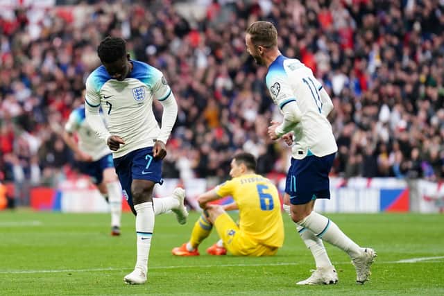 DECISIVE: England's Bukayo Saka celebrates with Jordan Henderson
