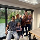 Benjamin Patel at home with members of his family