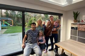 Benjamin Patel at home with members of his family
