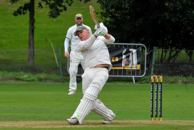 On their way: Charlie Parker hits a massive six as Airedale and Wharfedale champions Otley who beat Tong Park Esholt.