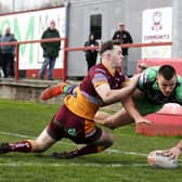 GETTING OVER THE LINE: Castleford Tigers' Innes Senior scores his side's fifth try against hosts Batley Bulldogs in their Challenge Cup sixth round match at Fox's Biscuits Stadium Picture: Jess Hornby/PA