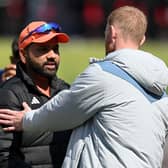 England captain Ben Stokes congratulates his opposite number Rohit Sharma after India won the final Test by an innings to take the series 4-1. Photo by Gareth Copley/Getty Images.
