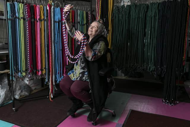 Caroline Rodgers, 56, is one of only 11 traditional ropemakers in the UK - and is believed to be the only female ropemaker with their own business in the north of England. Caroline bought the machinery from Outhwaites Ropemakers, in Hawes, after the company she worked for closed it's doors in late 2022. Instead of letting the ancient craft die, she wants to preserve the traditional method of rope making, pictured in her studio, in Askrigg, North Yorks.