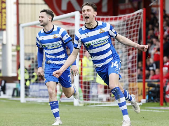 Doncaster Rovers Harrison Biggins celebrates after scoring their side's second goal in the 2-0 first leg win at Crewe (Picture: PA)
