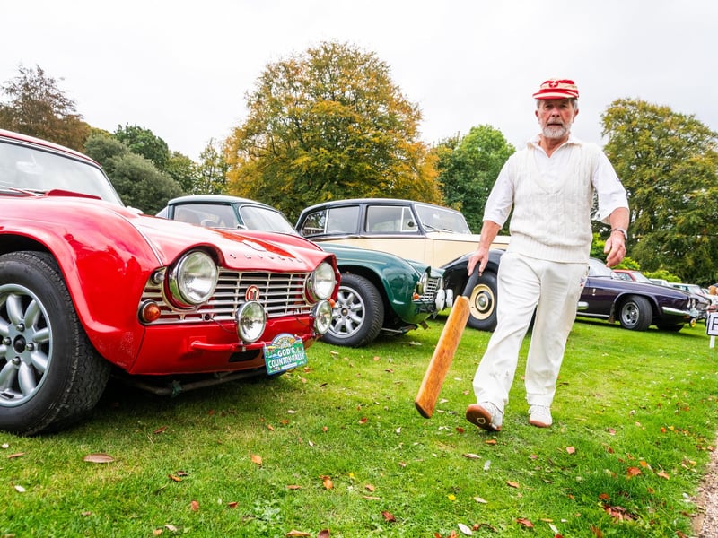 Pictured Martin Emmison, from Essex, who took part in today's drive walks passed the line up of classic cars after arriving at Bowcliffe Hall near Bramham.