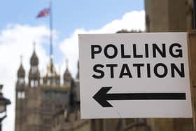 A sign outside a polling station in central Westminster, London. PIC: Victoria Jones/PA Wire
