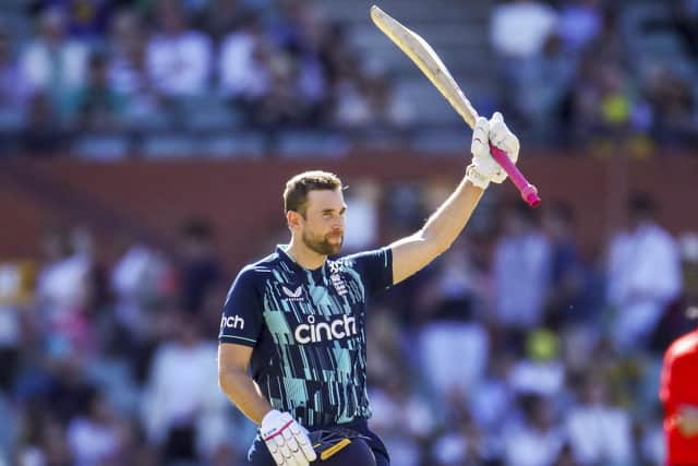 TAKE THAT: England's Dawid Malan celebrates his century during the one day cricket international against Australia in Adelaide. Picture: Matt Turner/AAP Image via AP