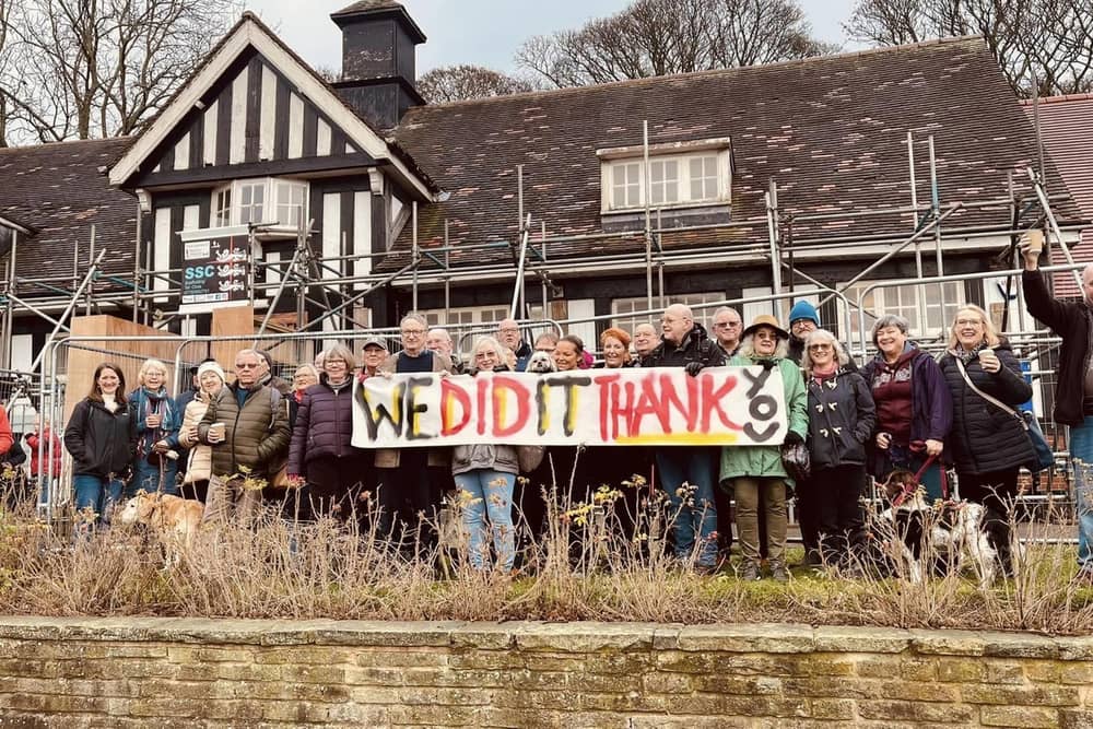 Campaigners celebrate saving the cafe at Graves Park