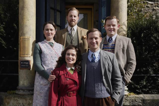 Togetherness: L-R clockwise: Samuel West (Siegfried Farnon), Callum Woodhouse (Tristan Farnon), Nicholas Ralph (James Herriot), Rachel Shenton (Helen Herriot), Anna Madeley (Mrs Hall) exterior Skeldale House. ©5 Broadcasting Limited / © Playground Television UK Ltd. 2026 / Photographer: Helen Williams