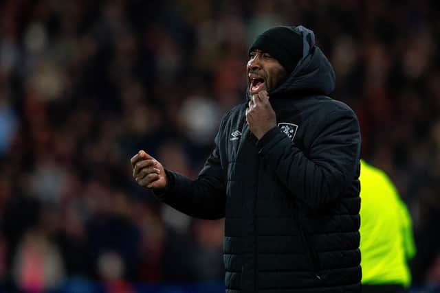 Huddersfield Town chief Darren Moore cajoles his side during Friday night's unlucky home loss to Middlesbrough. Picture: Bruce Rollinson.