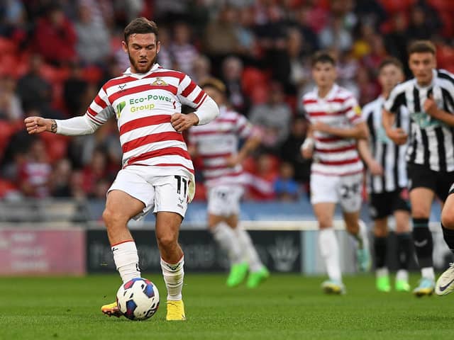 ON THE COMEBACK TRAIL: Winger Jon Taylor in action for Doncaster Rovers this week
