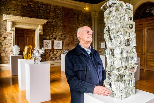Sir Tony Cragg next to one of many glass sculptures which are on display within the house. Picture By Yorkshire Post Photographer,  James Hardisty.