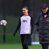POSSIBLE RETURN: Liverpool's Darwin Nunez and manager Jurgen Klopp during a training session aon Monday ahead of tonight's Champions League clash at Anfield against Real Madrid. Picture: Martin Rickett/PA