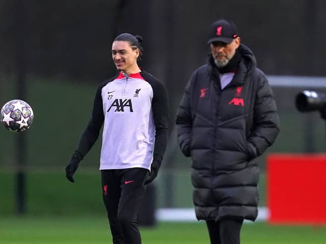 POSSIBLE RETURN: Liverpool's Darwin Nunez and manager Jurgen Klopp during a training session aon Monday ahead of tonight's Champions League clash at Anfield against Real Madrid. Picture: Martin Rickett/PA