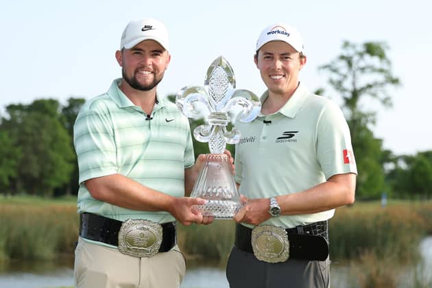 Alex Fitzpatrick (L) of England and Matt Fitzpatrick of England pose with the trophy on the 18th green after winning the Zurich Classic of New Orleans 2026 at TPC Louisiana on April 26, 2026 in Avondale, Louisiana. (Picture: Stacy Revere/Getty Images)