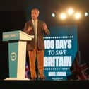 Reform UK leader Nigel Farage speaking at the Reform UK First 100 Days rally, in Plymouth, Devon. PIC: Zoe Head-Thomas/Press Association