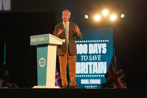 Reform UK leader Nigel Farage speaking at the Reform UK First 100 Days rally, in Plymouth, Devon. PIC: Zoe Head-Thomas/Press Association