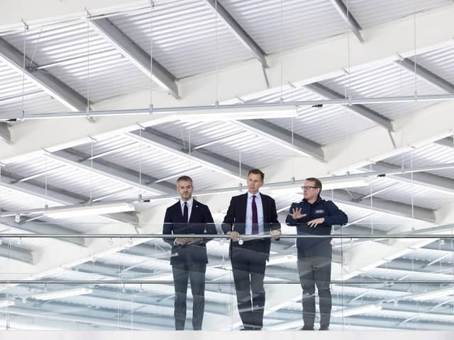 Chancellor Jeremy Hunt with Mayor of South Yorkshire Oliver Coppard (left) and CEO of AMRC Steve Foxley (right), during a visit to Factory 2050 in South Yorkshire.