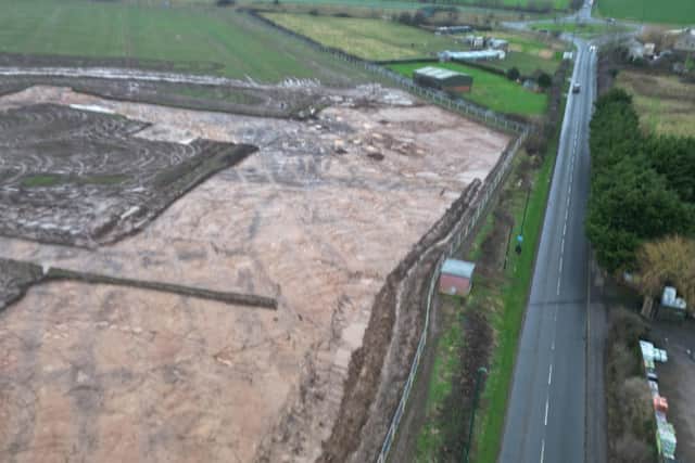 An aerial view of the site with Longbeck Road to the right