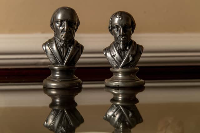 Metal pepperettes in the form of Gladstone & Disraeli