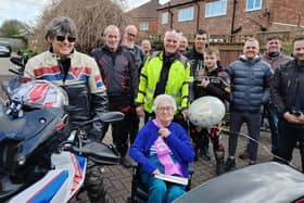 Betty Wood (front, centre) with bikers from the region on her 100th birthday.