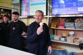 Labour Party leader Sir Keir Starmer with an ice cream during a visit to the seaside resort of Blackpool. PIC: Peter Byrne/PA Wire