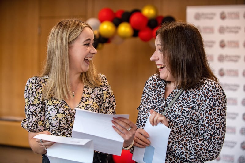 Barnsley College A-Level results. Amy Barton opens her results with her mother Emma Hughes to find she got  A* 2A's and will study English at Nottingham. Picture by Yorkshire Post Photographer Bruce Rollinson 17 August 2023.