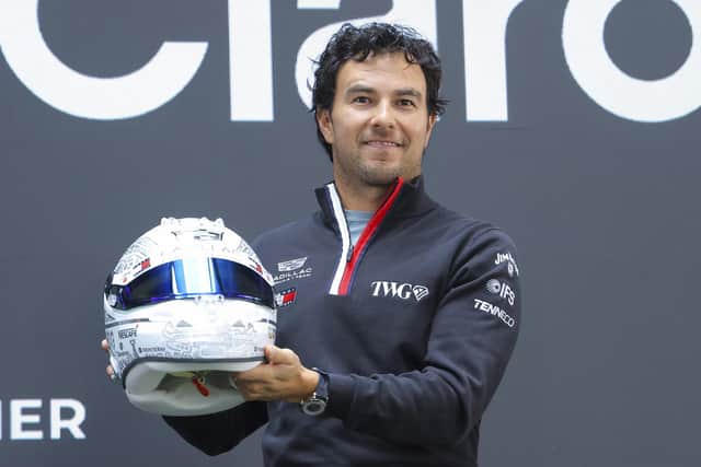 Landmark: Driver Sergio Perez poses with his helmet during a press conference at Teatro Telcel on October 27, 2026 in Mexico City, Mexico. (Picture: Agustin Cuevas/Getty Images)