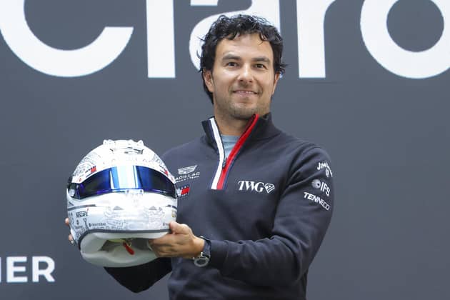 Landmark: Driver Sergio Perez poses with his helmet during a press conference at Teatro Telcel on October 27, 2026 in Mexico City, Mexico. (Picture: Agustin Cuevas/Getty Images)