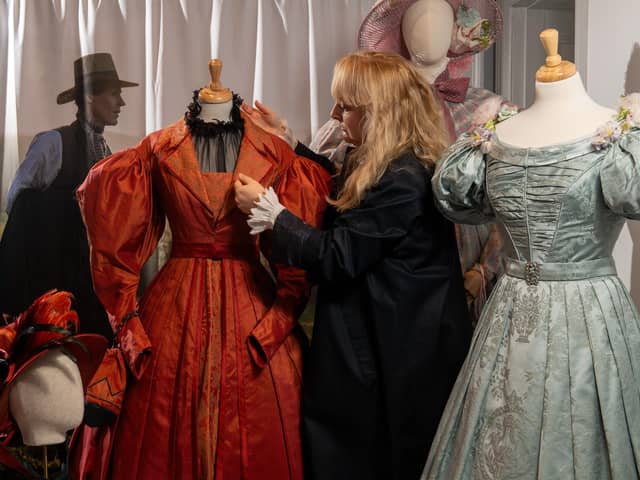 The Art of Making Historical Fashion a new exhibition at  the Bankfield Museum, Halifax.
Pictured is Elinor Camille-Wood,  curator of the exhibition with costumes from Gentleman Jack designed by Tom Pye.
Picture Bruce Rollinson