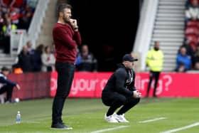 NOT QUITE: Birmingham City's Wayne Rooney (right) on the touchline at the Riverside Stadium. Picture: Will Matthews/PA