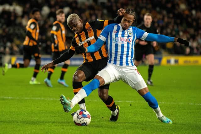 ON A HIGH: Huddersfield Town midfielder David Kasumu